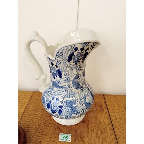 75 - Vintage blue and white jug with carp design