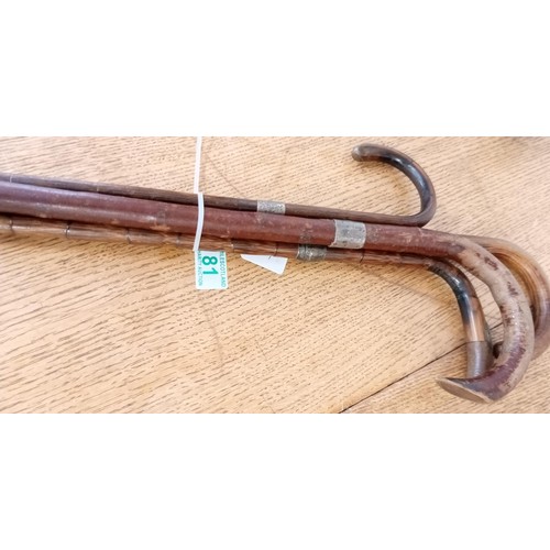 81 - 4 x times walking sticks with silver hallmarked bands