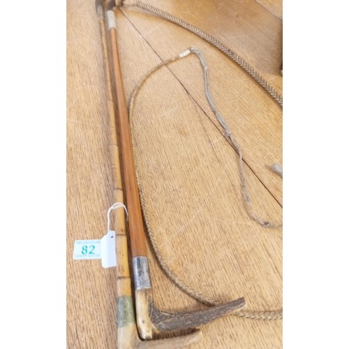 82 - 1 x bamboo hunting whip and 1 cane riding crop both with silver mounts