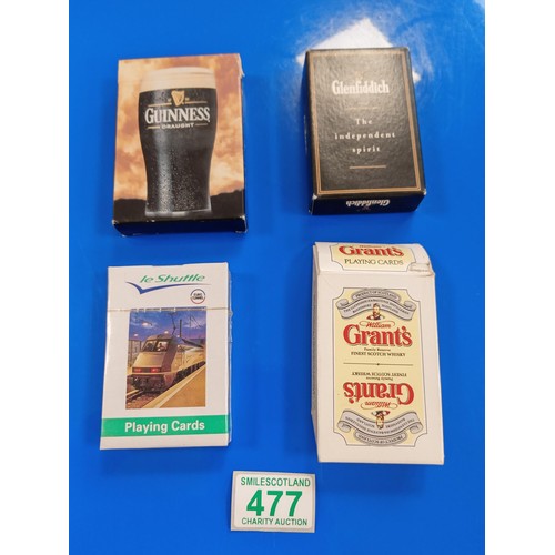 477 - 4 packs of advertising playing cards: William Grant whisky, Glenfiddich, Guinness, Lee Shuttle