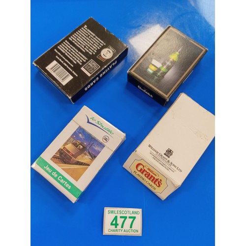 477 - 4 packs of advertising playing cards: William Grant whisky, Glenfiddich, Guinness, Lee Shuttle