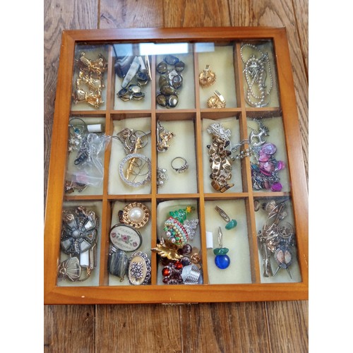 3 - Selection of fashion jewellery in a display case