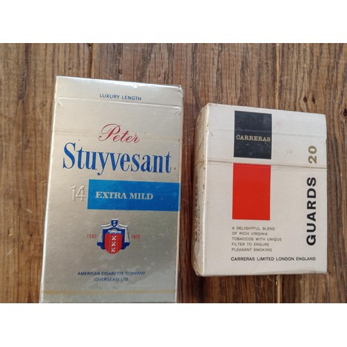 74 - 2 packets of vintage sealed cigarettes, Guards filter 20 & Peter Stuyvesant 14