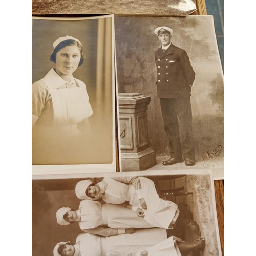 99 - Vintage armed forces photos and postcards and a folder of paperwork