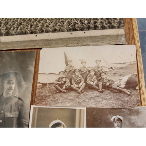 99 - Vintage armed forces photos and postcards and a folder of paperwork