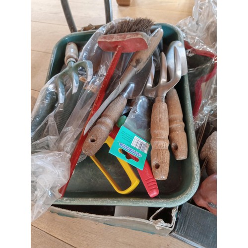 219 - Garden ornaments, tools etc