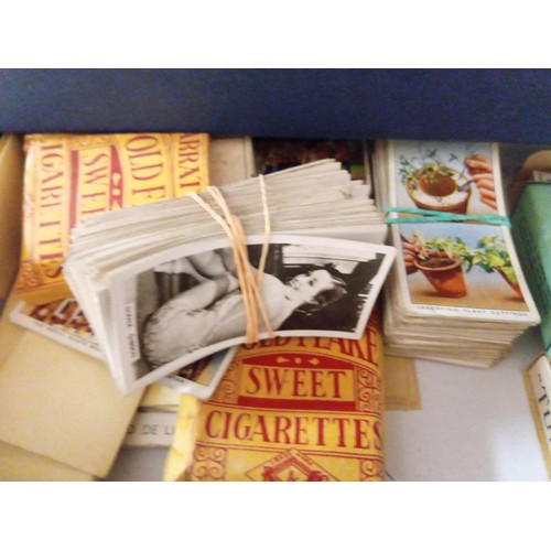 117 - Box of cigarette cards and others inc. Risqué ones