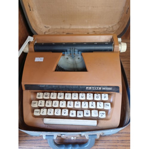 139 - Vintage Petite Child's typewriter and child's sewing machine