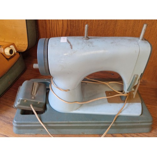 139 - Vintage Petite Child's typewriter and child's sewing machine