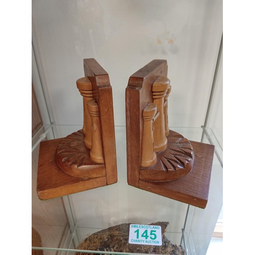 145 - Pair of castle wooden bookends