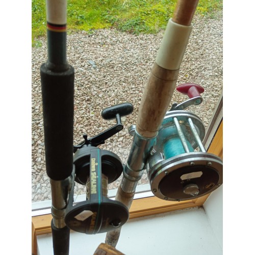 181 - 2 x sea fishing rods with reels