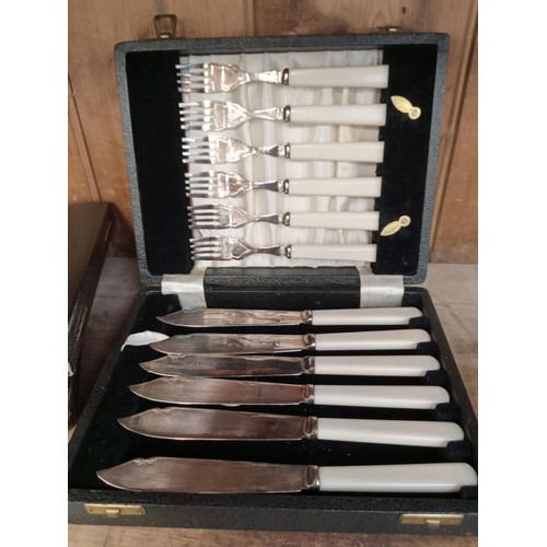 213 - Seven various boxed EPNS cutlery ware.