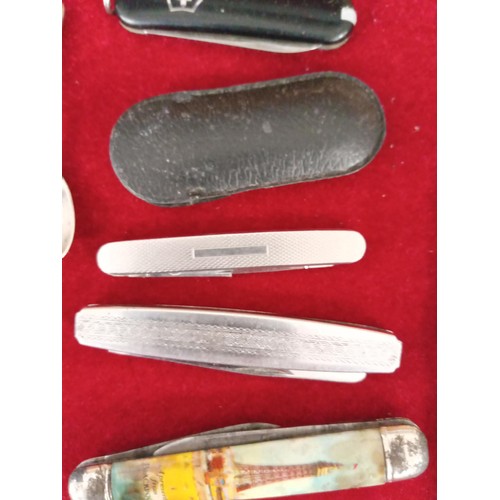 235 - A selection of pen knives etc.