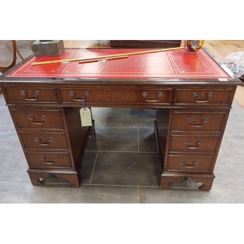 283 - Regency Style desk with red leather inlay.