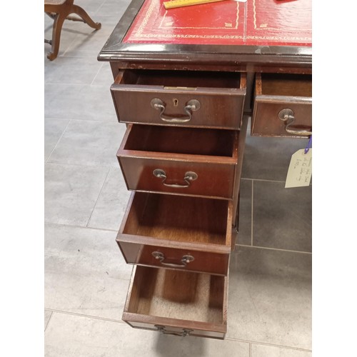 283 - Regency Style desk with red leather inlay.