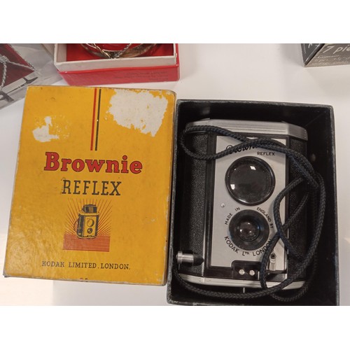 138 - An unusual lot to include Viners honey drum, A Brownie reflex camera & 7 piece coaster set