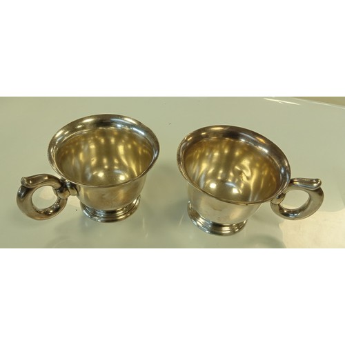 182 - A pair of white metal drinking vessels not much known about them.  They weigh over 300g each approx ... 