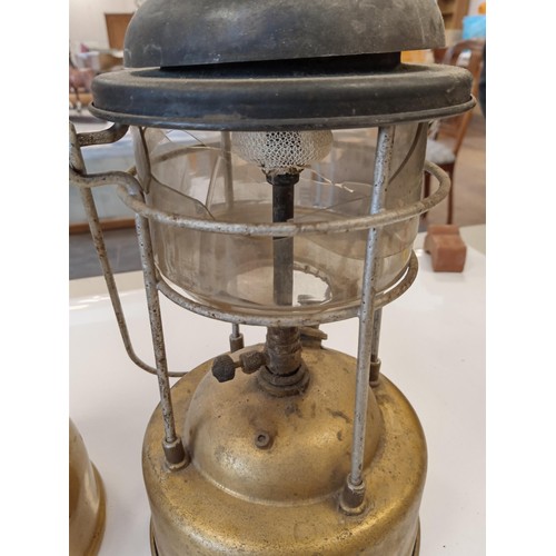 192 - A pair of Tilley Lamps, model 246 is written on one