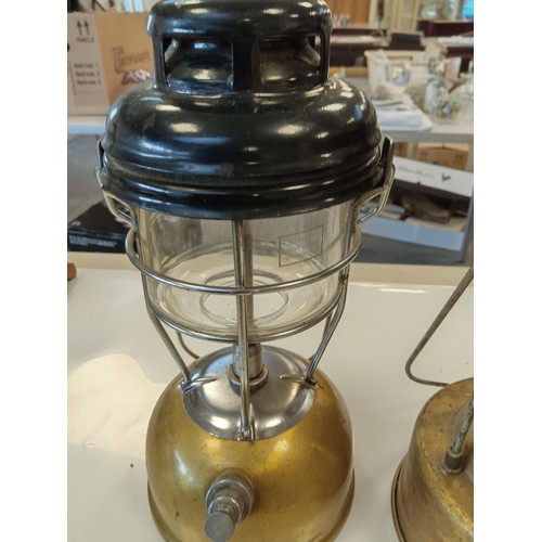 192 - A pair of Tilley Lamps, model 246 is written on one