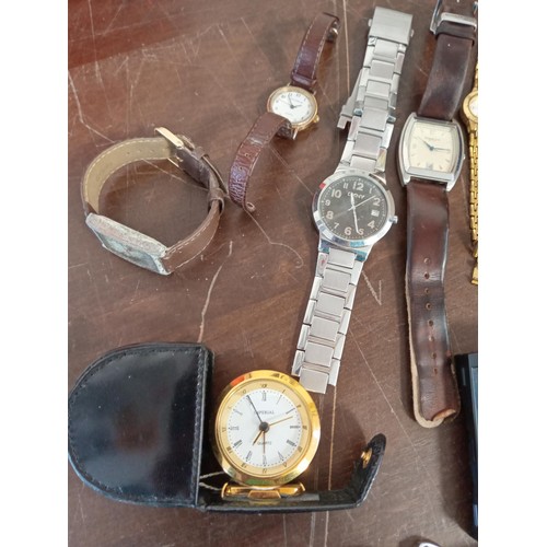 207 - direct from a deceased estate  8 watches, Pocket watch , Zippo Lighter , Fountain pen and a travel c... 