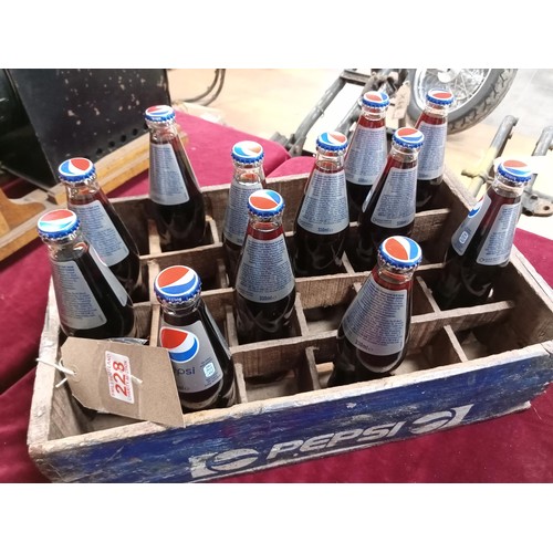 Vintage Pepsi crate with a dozen bottles of Pepsi