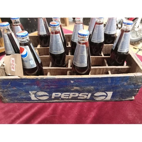 Vintage Pepsi crate with a dozen bottles of Pepsi