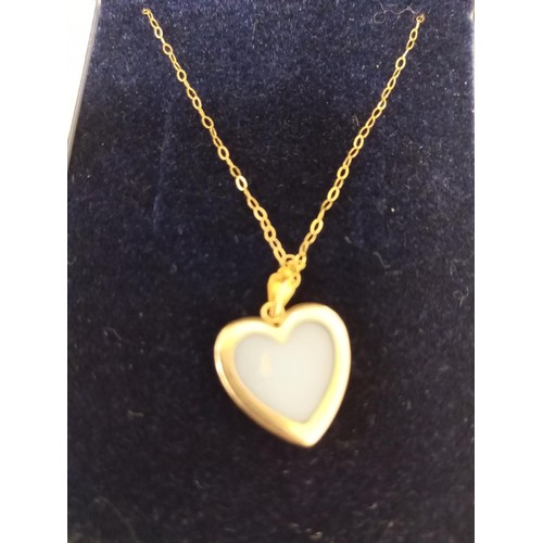 69 - 9ct gold simulated blue Cameo heart pendant and necklace