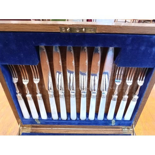 86 - Sterling silver collared cutlery set in original box.  Mop handles Sheffield 1926.  Maker John Sande... 