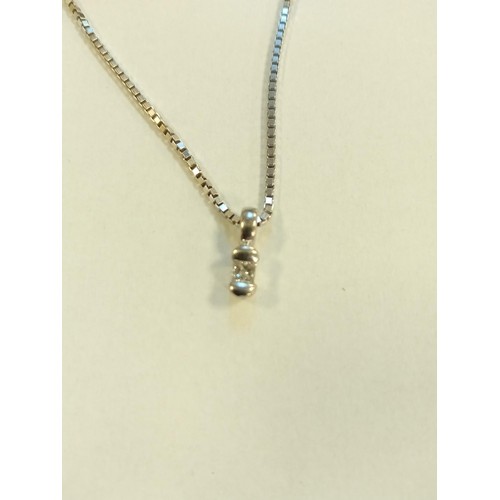 89 - 18ct white gold and diamond pendant on an 18ct white gold box chain, 11.4g approx.