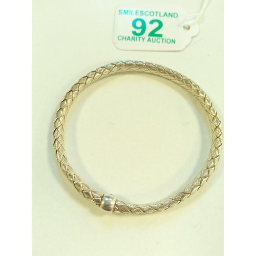 92 - 2x white metal bracelets