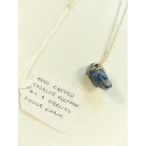 106 - Hand carved sodalite elephant on a silver chain