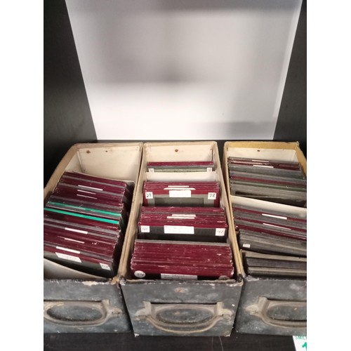 135 - A good selection of vintage glass slides