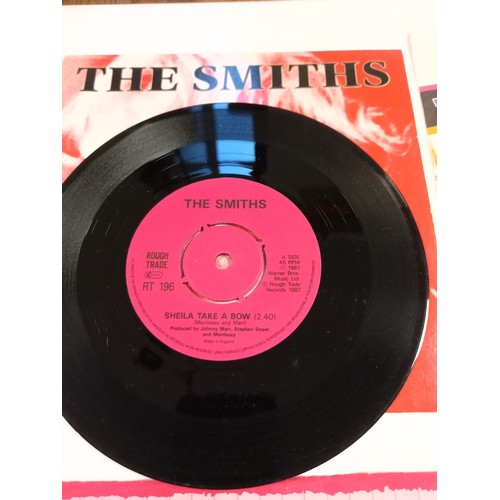 91 - 6 punk 45 RPM records to include 2 by The Smiths, Oasis, The Dickies, Angelic Upstart & The Adverts