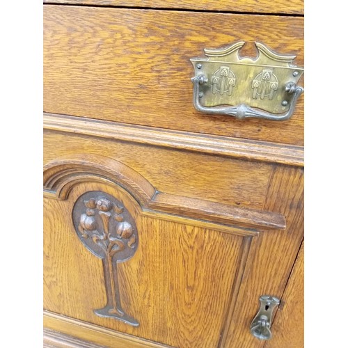 58 - Art Nouveau oak dresser with brass handles