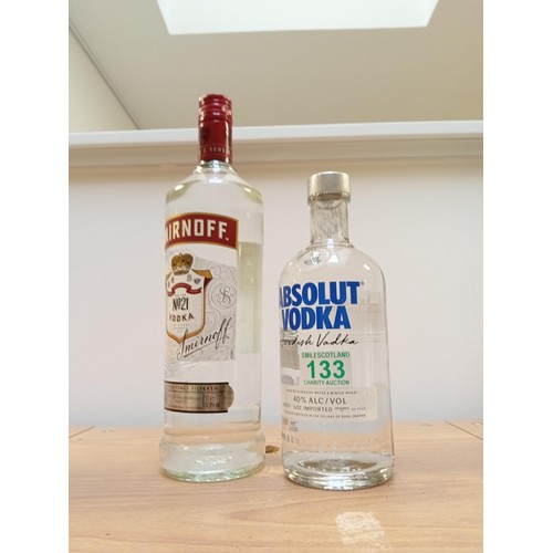 133 - 1 Litre Smirnoff Vodka & bottle of Absolut vodka