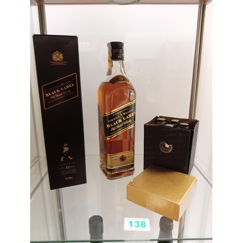 138 - 70cl Johnnie Walker Black Label plus Johnnie Walker miniature black label set