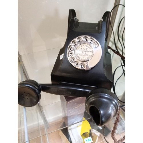 140 - Vintage dial telephone with modern connection