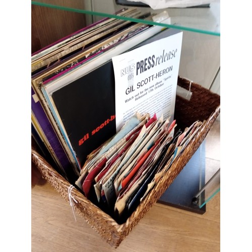 172 - A basket full of LP's and singles