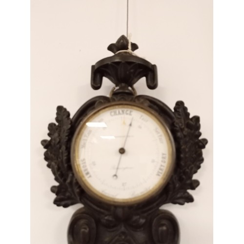 189 - Antique barometer with clock in cast metal