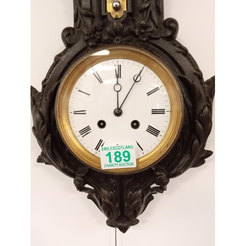 189 - Antique barometer with clock in cast metal