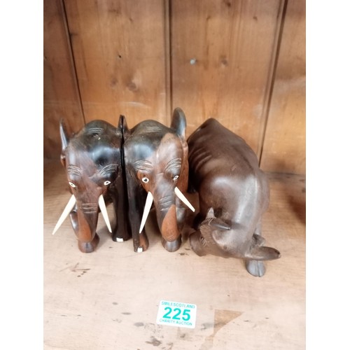 225 - Wooden elephant book ends and a wooden bison