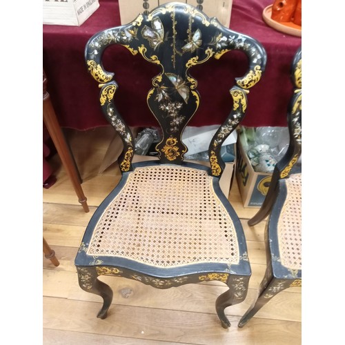 299 - a pair of mother of pearl inlay and Rattan chairs