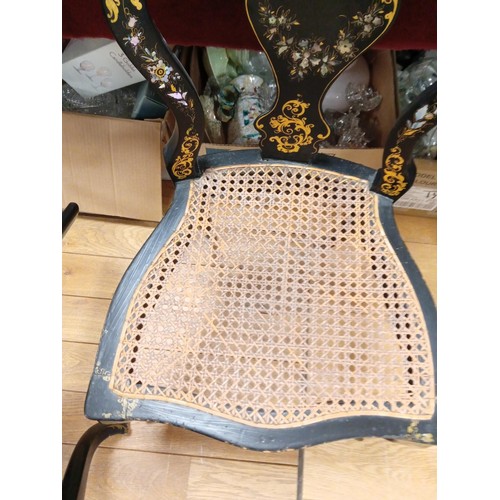 299 - a pair of mother of pearl inlay and Rattan chairs