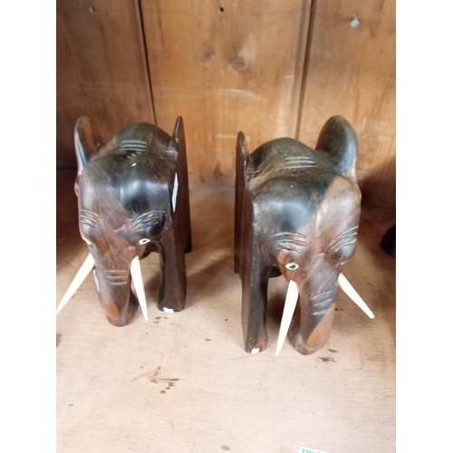 225 - Wooden elephant book ends and a wooden bison