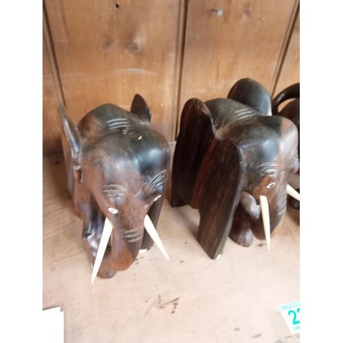 225 - Wooden elephant book ends and a wooden bison