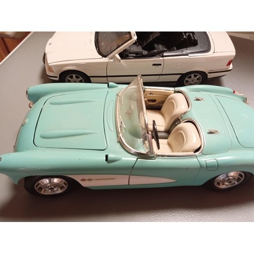 41 - 2x 1:18 scale cars inc. Maisto BMW 325i convertible (1993) & Burago Chevrolet Corvette 1957 made in ... 