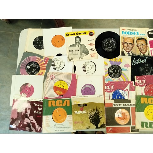 64 - Large selection of 45 RPM records mainly jazz