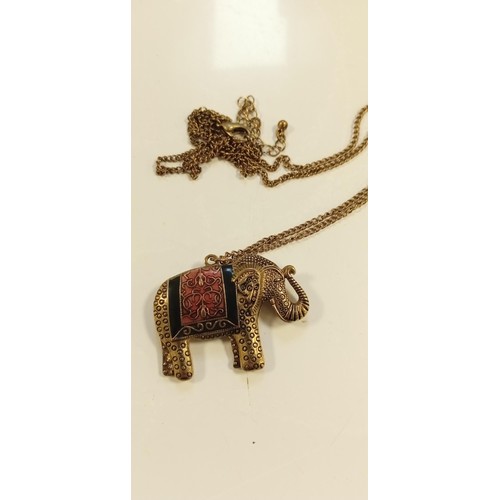 79 - Double sided elephant necklace in lovely condition