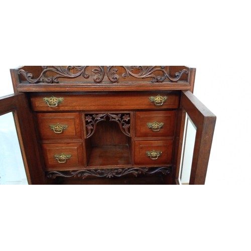 16 - Ornate wall cabinet with inner drawers