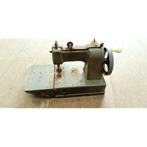 51 - Vintage childs manual sewing machine